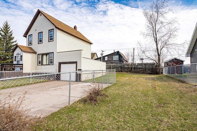 view of side of property featuring a chimney, a yard, fence, a garage, and concrete driveway