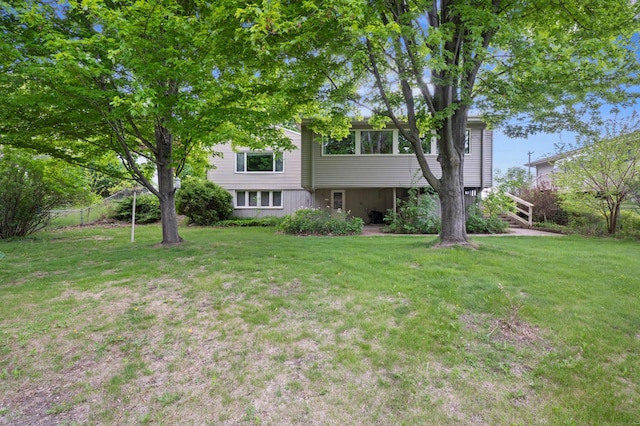 615 9th Ave SW, Faribault, MN 55021 - rear view of house featuring stairway