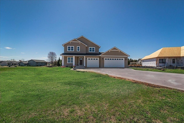craftsman house featuring an attached garage, driveway, and a front yard