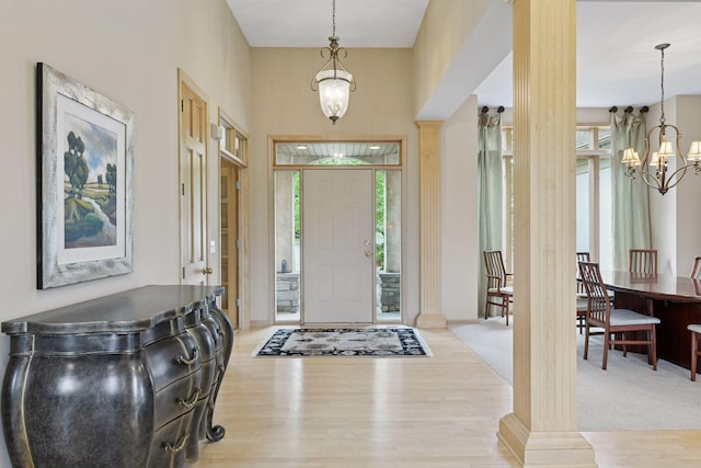 809 Saint Moritz, Victoria, MN 55386 - entrance foyer featuring a chandelier and wood finished floors