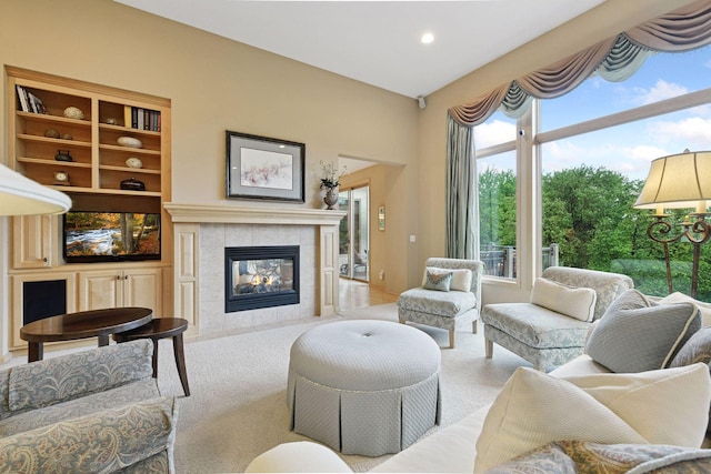 809 Saint Moritz, Victoria, MN 55386 - living room featuring carpet floors, a tile fireplace, and recessed lighting