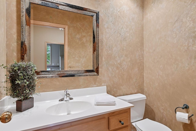 809 Saint Moritz, Victoria, MN 55386 - bathroom with toilet, vanity, and a textured wall