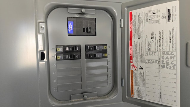 utility room featuring electric panel