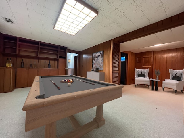 rec room with wood walls, visible vents, billiards, and carpet