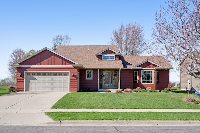 2797 Ocarina Dr, Sauk Rapids, MN 56379 - view of front of house with a garage, a front lawn, a shingled roof, board and batten siding, and concrete driveway