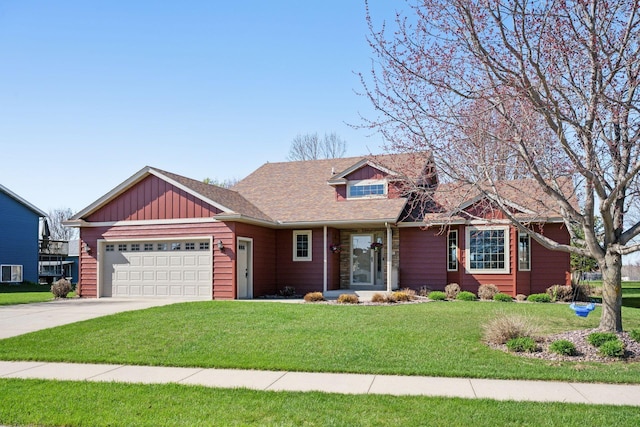 2797 Ocarina Dr, Sauk Rapids, MN 56379 - view of front of house featuring board and batten siding, an attached garage, concrete driveway, and a front yard