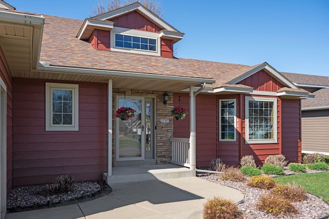 2797 Ocarina Dr, Sauk Rapids, MN 56379 - view of front of property with board and batten siding, a shingled roof, and a porch