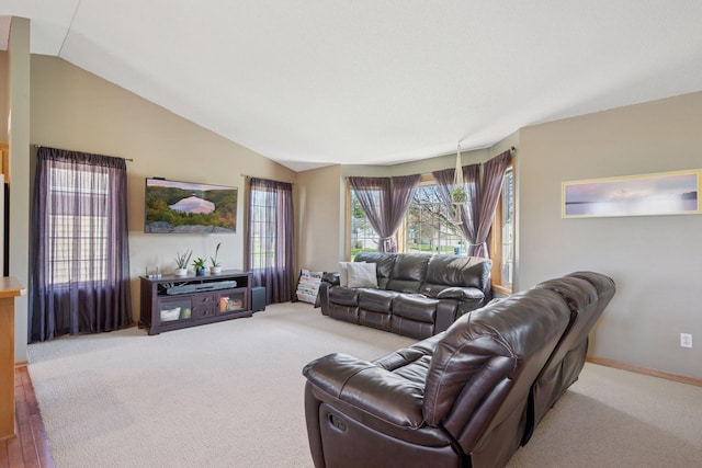 2797 Ocarina Dr, Sauk Rapids, MN 56379 - living area with lofted ceiling and carpet