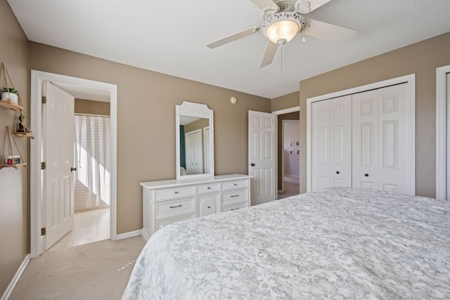2797 Ocarina Dr, Sauk Rapids, MN 56379 - bedroom with baseboards, light colored carpet, ceiling fan, and a closet