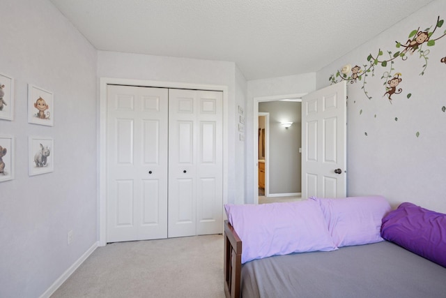 2797 Ocarina Dr, Sauk Rapids, MN 56379 - bedroom with baseboards, light colored carpet, and a closet