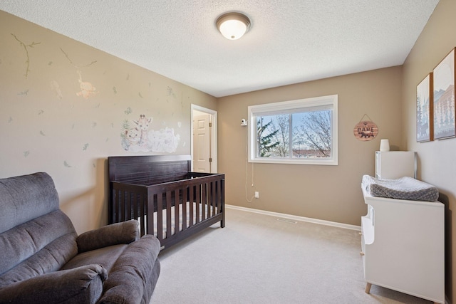 2797 Ocarina Dr, Sauk Rapids, MN 56379 - bedroom featuring light colored carpet, a textured ceiling, and baseboards