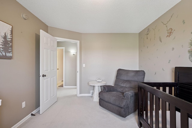 2797 Ocarina Dr, Sauk Rapids, MN 56379 - bedroom featuring light colored carpet, a textured ceiling, and baseboards