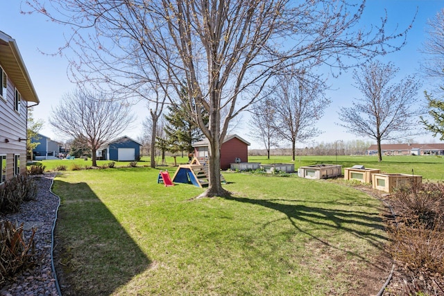 2797 Ocarina Dr, Sauk Rapids, MN 56379 - view of yard with an outdoor structure