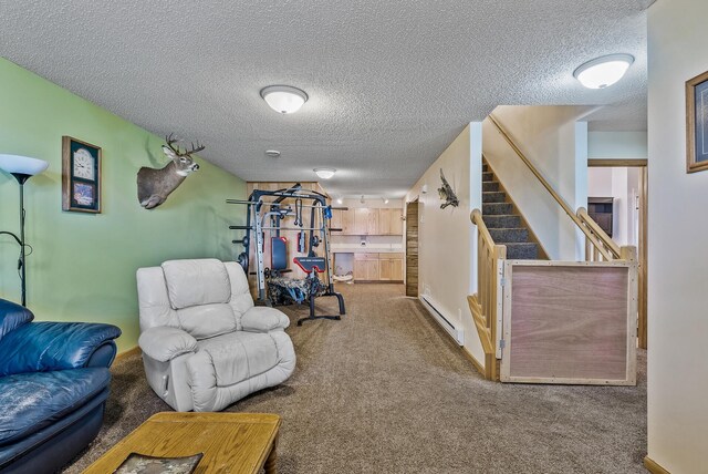 interior space featuring carpet floors, stairs, baseboards, a textured ceiling, and a baseboard radiator