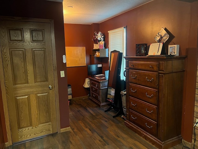 822 Holcombe Ave N, Litchfield, MN 55355 - home office with a textured ceiling, baseboards, and dark wood finished floors