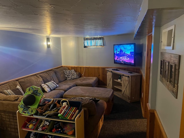 822 Holcombe Ave N, Litchfield, MN 55355 - carpeted living area featuring wood walls and wainscoting