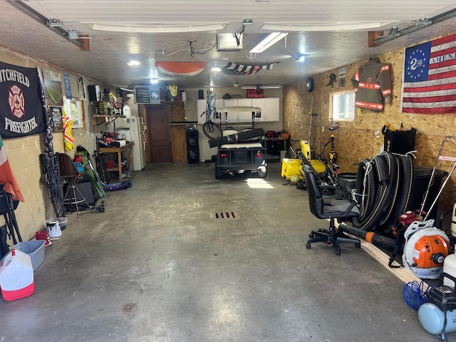 822 Holcombe Ave N, Litchfield, MN 55355 - garage featuring a garage door opener