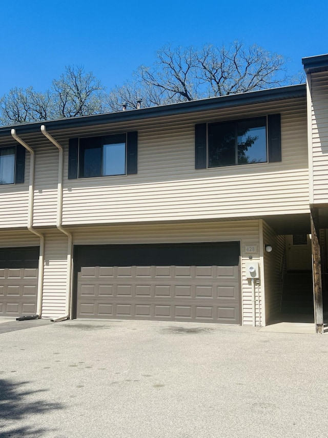 exterior space with a garage