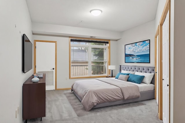 2530 34th St Unit 111, Minneapolis, MN 55406 - bedroom featuring light colored carpet and baseboards