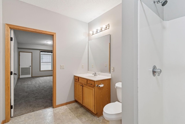 2530 34th St Unit 111, Minneapolis, MN 55406 - full bath featuring toilet, vanity, baseboards, a shower, and a textured ceiling