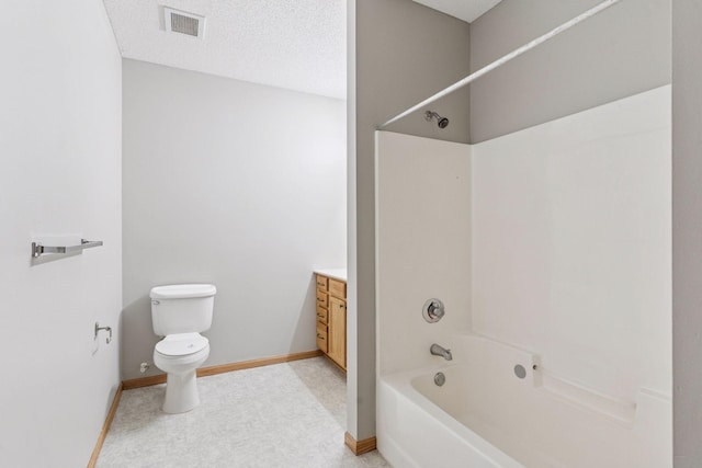 2530 34th St Unit 111, Minneapolis, MN 55406 - bathroom featuring vanity, toilet, shower / bathtub combination, and baseboards