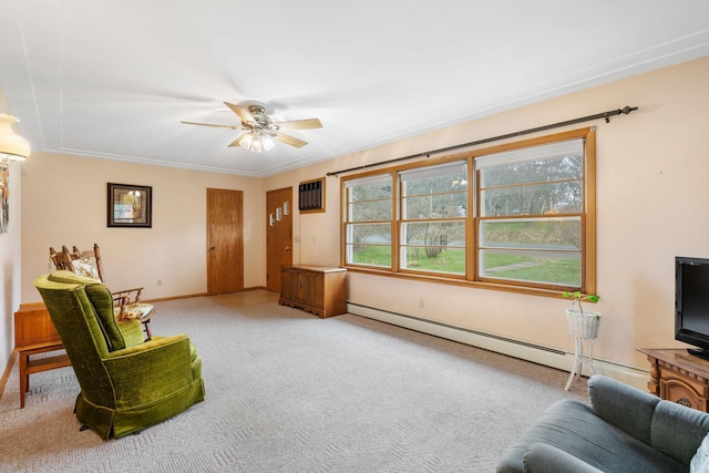 living room with ceiling fan, a wall mounted AC, baseboard heating, baseboards, and light carpet