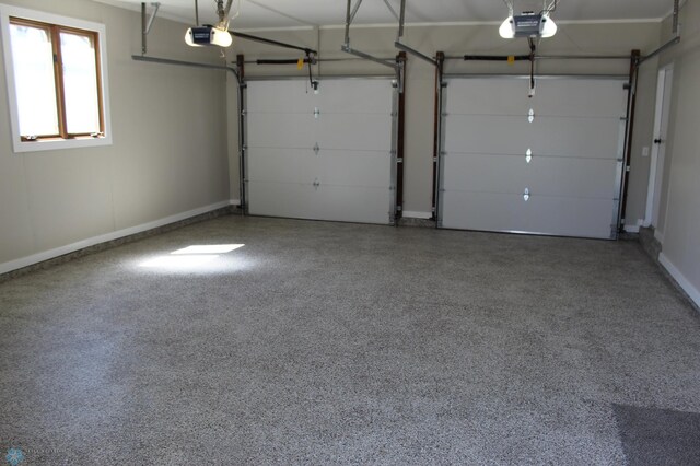 garage featuring baseboards and a garage door opener