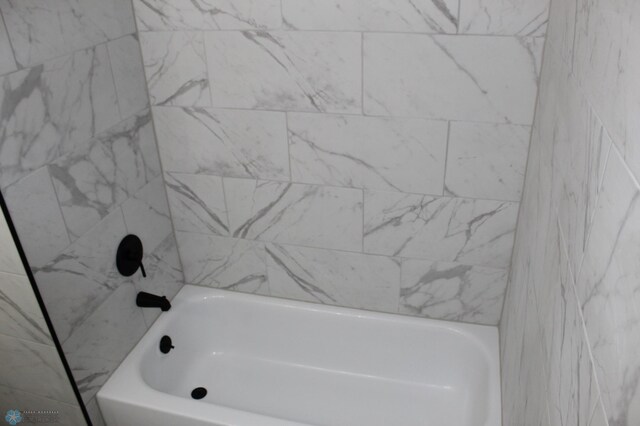 bathroom with a bath