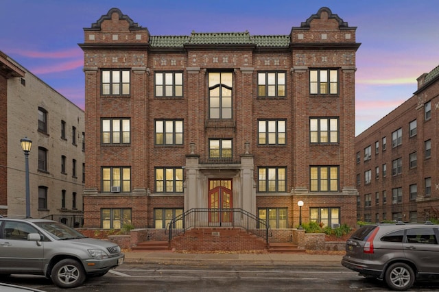 view of property at dusk