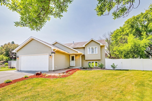18095 Exeter Pl, Farmington, MN 55024 - split level home featuring an attached garage and driveway