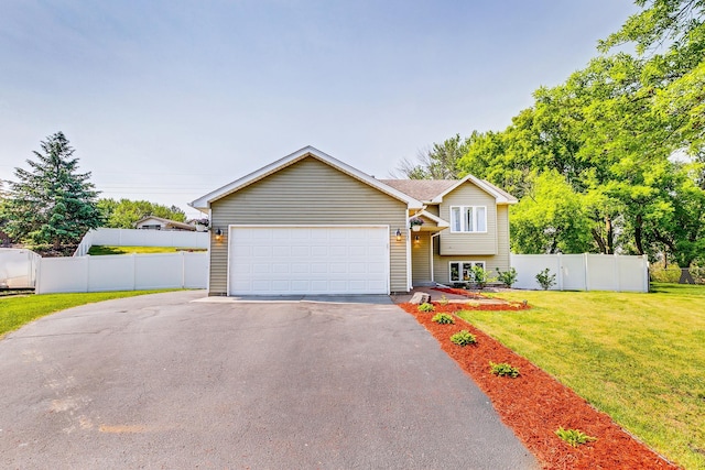 18095 Exeter Pl, Farmington, MN 55024 - tri-level home with driveway and an attached garage