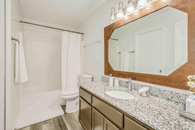 18095 Exeter Pl, Farmington, MN 55024 - bathroom with vanity, shower / bath combination with curtain, toilet, and wood finished floors