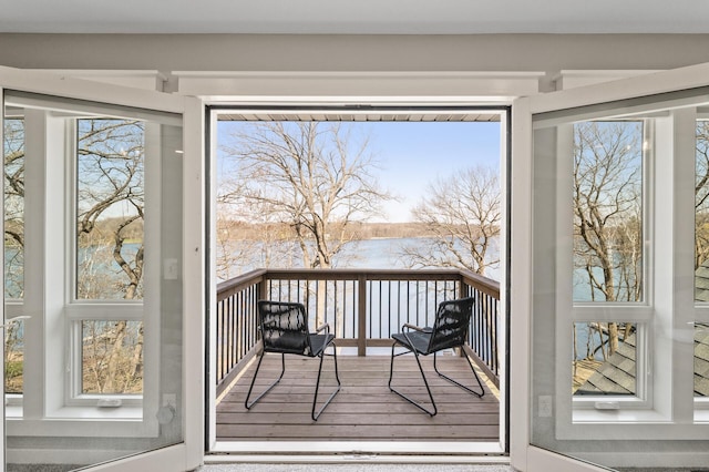 doorway to outside with wood finished floors