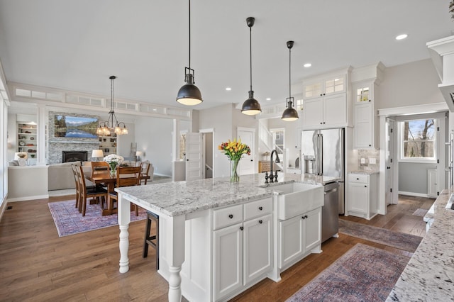kitchen with white cabinetry, dishwasher, dark wood-style floors, and glass insert cabinets