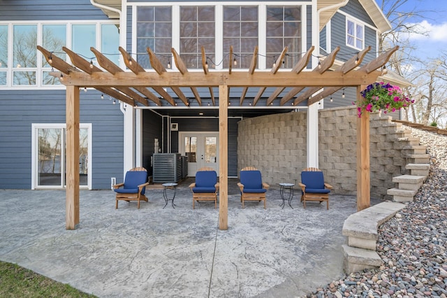 9129 279th Ave NW, Zimmerman, MN 55398 - view of patio featuring a pergola and french doors