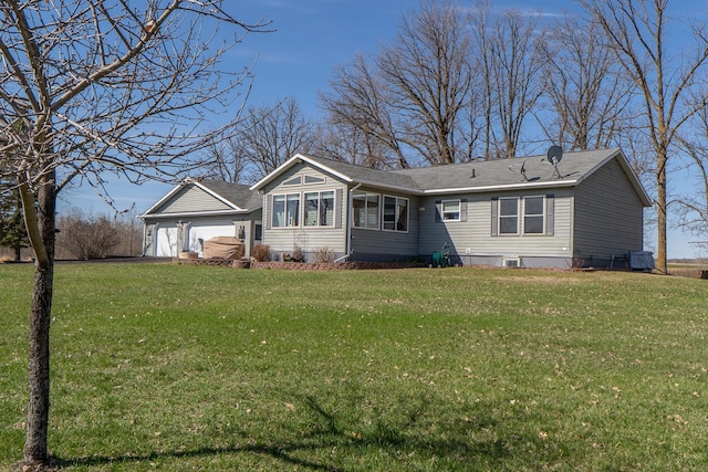 back of house featuring a yard