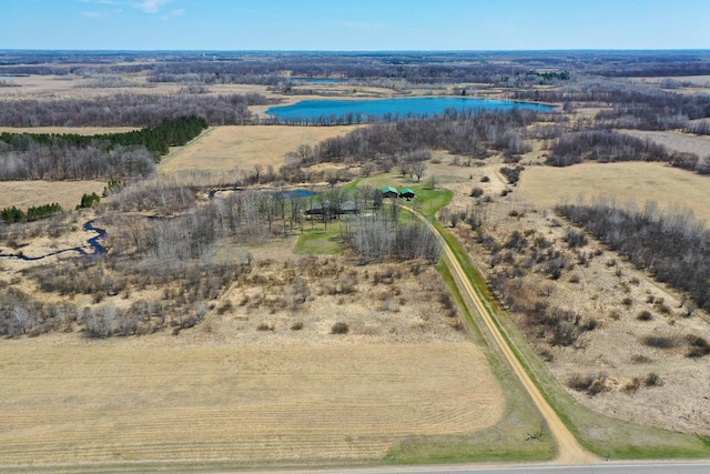 aerial view with a rural view and a water view