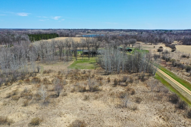 birds eye view of property with a rural view