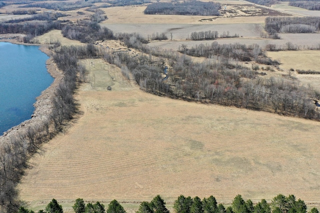 aerial view featuring a rural view and a water view