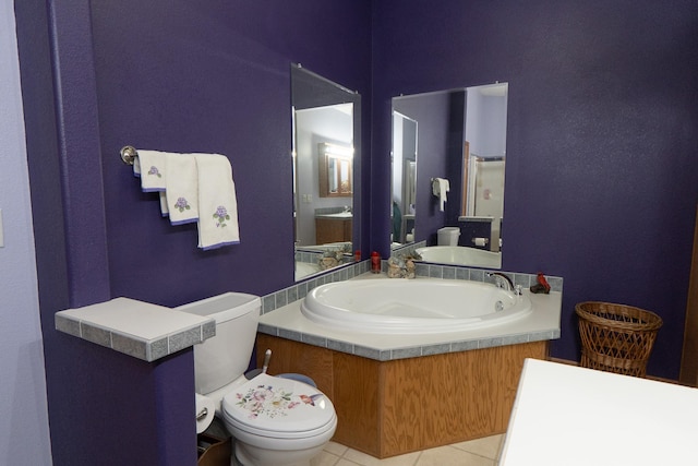 bathroom with toilet, tile patterned flooring, and vanity