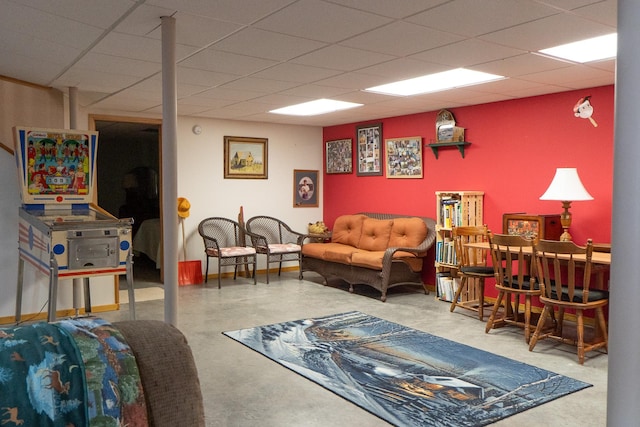 living area with concrete floors