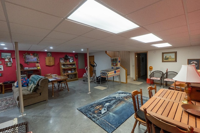 interior space featuring stairs, recessed lighting, and a drop ceiling