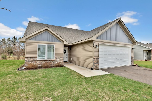 craftsman inspired home featuring a shingled roof, an attached garage, driveway, and stone siding