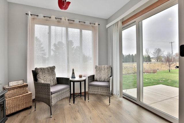 sitting room with wood finished floors