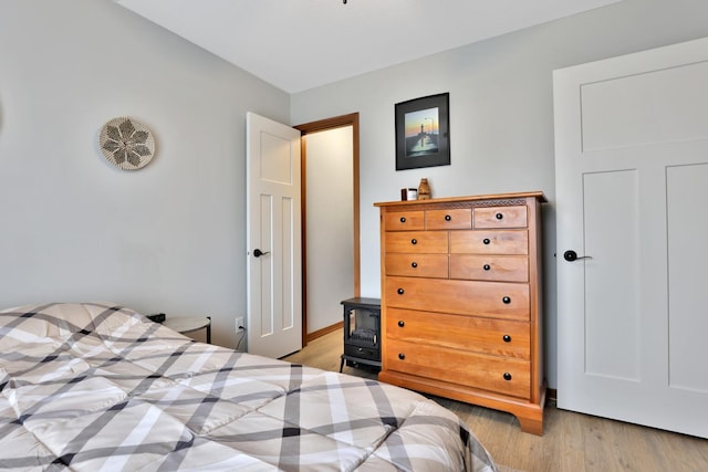 bedroom with light wood-type flooring