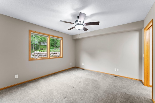 6300 Linden Ln, Mound, MN 55364 - carpeted spare room featuring a ceiling fan and baseboards