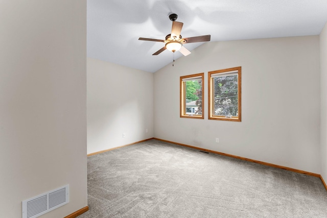 6300 Linden Ln, Mound, MN 55364 - carpeted empty room featuring a ceiling fan, vaulted ceiling, and baseboards