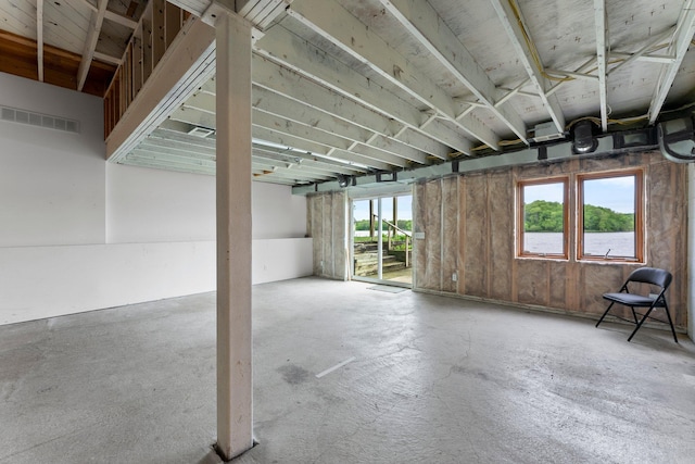 6300 Linden Ln, Mound, MN 55364 - miscellaneous room featuring unfinished concrete floors