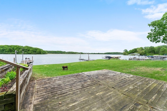 6300 Linden Ln, Mound, MN 55364 - wooden terrace with a dock, a water view, and a yard