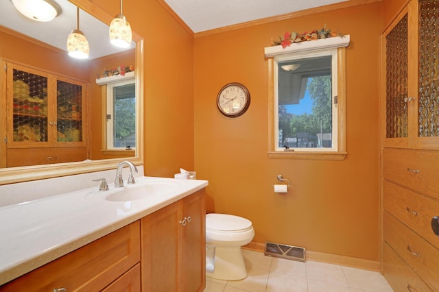 bathroom with toilet, tile patterned floors, visible vents, and ornamental molding